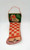 Vintage mesh Christmas stocking filled with kids toys and games. The stocking contains a paper checkers board, plastic chicken, Mystery tricks and puzzles and looks like a mask under the chicken.