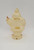 Harett-Gilmar Inc. Vintage Harett-Gilmar Plastic 7-inch King Santa Claus Bank Lite, back view of a classic beige plastic Santa Claus piggy bank with a coin slot on the back and a hole at the bottom for coin retrieval.