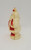 Harett-Gilmar Inc. Vintage Harett-Gilmar Plastic 7" King Santa Claus Bank Lite, a vintage plastic Santa figurine with a hollow body used as a coin bank, featuring a classic Santa Claus design with red and gold accents.