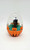 Unknown Vintage Halloween Black Cat Diorama Egg, Halloween-themed miniature diorama with a black cat inside a clear egg-shaped container decorated with orange Halloween pumpkin stickers.