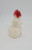 Unknown Vintage Plastic Snowman Christmas Ornament, a small white and red plastic snowman figurine with a red hat and scarf, used as a Christmas decoration.