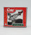 Coca-Cola 2002 Polar Bear Flying Plane Platinum Series Collection Ornament, vintage collectible Coca-Cola ornament featuring a polar bear flying a plane in original packaging.