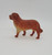 Vintage celluloid toy dog figure that resembles a Saint Bernard but not positive.  The figure is 3.5 inches long and 2.75 inches tall with a orange and tan color scheme.