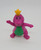 1993 Barney & Friends PVC toy figure of King Barney.  The figure stands 2.5 inches tall and features Barney wearing a yellow crown.