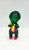Barney and Friends Baby Bop holding yellow blanket toy figure.  The figure stands 4.75-inches tall.