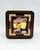 Hershey's Millennium Series Canister #2 - Hershey's Tin, vintage Hershey's tin featuring a retro-style illustration of a man in a suit holding a cup of coffee or cocoa, with bold Hershey's logo and decorative border.