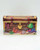 Wolfgang Candy 75th Anniversary Hinged Treasure Chest Tin, decorative metal candy tin with underwater scene featuring seahorses, fish, crab, and coral.