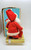 Unknown Vintage Musical Santa Claus Figure Sitting on Present, Made in Japan, festive Christmas decoration.