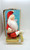 Vintage musical Santa figure sitting on present Made in Japan.  Wind up Santa and watch him rotate slowly to the sounds of Jingle Bells.  Santa has a grumpy look while sitting on a gold wrapped present.