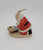 Vintage 1985 The Kneeling Santa ceramic ornament by Roman Inc.  The ornament features Santa Claus kneeling over baby Jesus with his hat off.