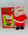 Vintage battery operated Walking Santa with multi-functions and I.C. Music.  Santa walks, rings bell and plays 3 songs.