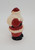 Unknown Santa Claus 3" Figural Candle, small figurine of Santa in traditional red and white outfit holding a sack, made of wax or resin for holiday decor.
