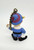 Memory Lane Rudolph the Red Nosed Reindeer Hermey Key Chain, detailed figurine of Hermey the elf holding a candy cane, with a colorful hat, dressed in festive winter attire.