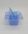 BEST Vintage BEST USA Hard Plastic Basket Candy Party Container - Blue, a small blue plastic basket with decorative cutouts and a handle designed for party candy storage.