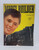 Lionel Trains Model Builder Vol 5. No.28 November 1941 magazine, vintage publication cover featuring a woman's face and a model train, historical model train magazine from 1941.