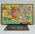 Colorforms Popples Colorforms Play Set, colorful illustration of playful plush toys and items in a bedroom scene, including a skateboard, baseball, and various tokens from the play set.