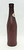 Pepsi-Cola Plastic Brown Bottle, product image of a brown plastic Pepsi-Cola bottle with a cap and partial label visible.