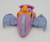 Marvel McDonald's Happy Meal Toy 1995 Marvel Spider-man Hobgoblin Landglider, a vintage purple and orange toy vehicle featuring bat-like wings and a pink front, inspired by Spider-Man's villain.