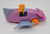 Marvel McDonald's Happy Meal Toy 1995 Marvel Spider-man Hobgoblin Landglider, a vintage toy with a purple vehicle and a miniature figure of Hobgoblin in a yellow hood and green face, featuring pink and gray accents.