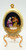 AVON 2002 Holiday Treasures Nativity Scene Egg, ornate gold-colored decorative Easter egg with a miniature nativity scene inside featuring Mary, Joseph, and Baby Jesus.