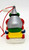 Hershey's 1996 Hershey's Kiss on Snowmobile PVC Ornament, colorful holiday snowmobile with Hershey's Kiss snowmobile character and festive decorations.