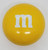 Yellow M&M's 3-inch tin, snack container featuring the white M&M character logo on a yellow background.