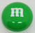 M&M's Green M&M 3-inch Tin, green circular tin with white M&M's logo on the lid.