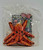 Wendy's Kids' Meal Toy 2000 Wild Life - Orange Octopus with Suction Cup, plush toy with orange and black floral pattern and suction cup at the bottom.