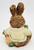 Product ABC Inc ABC Patchwork Bunny Wearing Carrot Sweater 3.5 inch Resin Figurine, cute bunny figurine with patchwork design, wearing a carrot sweater, made of resin, detailed craftsmanship.