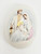 Unknown Nativity Scene Decorative 3" Egg with Jesus, Mary, and Joseph, featuring a miniature depiction of the Holy Family with Jesus in Mary or Joseph's arms, in a soft, painted style.