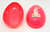 Unknown Vintage 5-inch Plastic Pink Easter Egg with Easter Bunny Picture, open and closed view of the Easter egg showing bunny design on the surface.