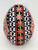 Unknown Pysanka Easter Egg with Christian Cross, vibrantly decorated with intricate floral and geometric patterns in orange, black, white, and purple.