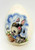Unknown Decorative Ceramic Egg with Baby Donkey on it, ceramic egg featuring a cute donkey with large eyes, pink flowers, a butterfly, and a basket of carrots painted on it.