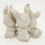 Enesco Precious Moments 1994 'Another Year and More Grey Hares' collectible figurine, featuring three white bunnies with long ears and rounded bodies on a simple white background.
