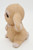 Ceramic Seated Brown Bunny Scratching Ear Figurine