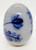 Unknown Grey with Blue Flowers Ceramic 3" Egg, decorative hand-painted ceramic egg with blue floral design on a grey background.