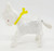 Unknown Vintage Plastic Lamb with Yellow Bow Wind Up Toy, clear plastic lamb figurine with yellow bow and wind-up mechanism.