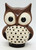 Unknown Vintage Ceramic Owl Candle Holder, decorative owl-shaped ceramic candle holder with large eyes and perforated belly for holding a candle.