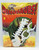 Atlas Editions Dinosaurs! Discover The Giants Of The Prehistoric World Vol. 2, colorful dinosaur illustration with a white dinosaur-shaped puzzle in front.