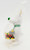 Applause Christmas White Reindeer Playing Drum PVC Toy Figure, festive holiday-themed ornament of a white reindeer with a green nose, playing a drum, in a plastic packaging.