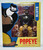 Boss Fight Studio Popeye Classics - Bluto 1:12 Scale Action Figure, enclosed in packaging featuring cartoon illustration of Bluto with a big smile and muscular arm, dressed in black shirt, yellow shorts and cap, with the figure visible through clear plastic window.