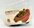 Wendy's Kids' Meal Toy 1994 Cybercycles - Blue Trike, colorful toy in packaging with a vibrant, abstract design of a tricycle