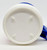 Uni-Mart Whirley Industries Uni-Mart Plastic 32 ounce Travel Mug, view of the bottom of a white and blue travel mug showing manufacturing details.