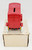 ERTL 1989 Die-Cast Bank: Sun-Maid Raisins 1905 Ford Delivery Truck, red vintage toy truck on a cardboard box.