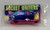 Wendy's Kids' Meal Toy 1992 Rocket Writers - Purple and Green, a small toy car with a colorful packaging showing a space-themed design and a cartoon rocket car illustration.