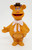 Muppet's Jim Henson's The Muppets 1978 Fozzie Bear Toy Figure, vintage plush toy with orange textured fur, brown hat, white polka dot scarf, and expressive face.