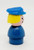Fisher-Price Fisher Price Original Little People Caucasian Policewoman / Tow Truck Driver, vintage wooden figurine of a policewoman with blonde hair, blue uniform, and blue police cap.