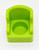 Fisher-Price Original Little People #952 Family House - Lime Green Armchair, a small lime green plastic armchair with curved armrests and a round seat designed for children's play.
