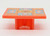 Fisher-Price Original Little People #985 Play Family Houseboat - Lobster Dinner Picnic Table, small orange wooden table with colorful laminated top featuring a lobster dinner scene.
