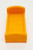 Fisher-Price Original Little People Single Bed - Orange Diamond Pattern, plastic toy bed in orange with a diamond pattern, suitable for children's playsets.